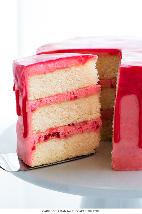 Raspberry Champagne Cake with raspberry drip glaze and fresh raspberries | by Carrie Sellman for TheCakeBlog.com