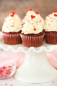 Red Velvet Cupcakes - super easy to make and stay moist for days, with a classic red velvet flavor and cream cheese frosting | Lindsay Conchar for TheCakeBlog.com