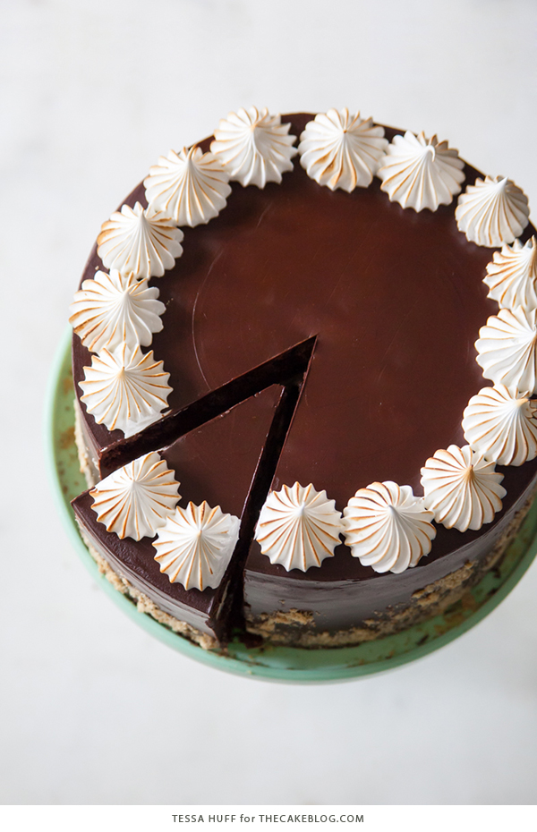 S'mores Cake - s'more inspired layer cake recipe with chocolate cake, graham cracker buttercream, chocolate ganache and toasted marshmallow meringue | by Tessa Huff for TheCakeBlog.com
