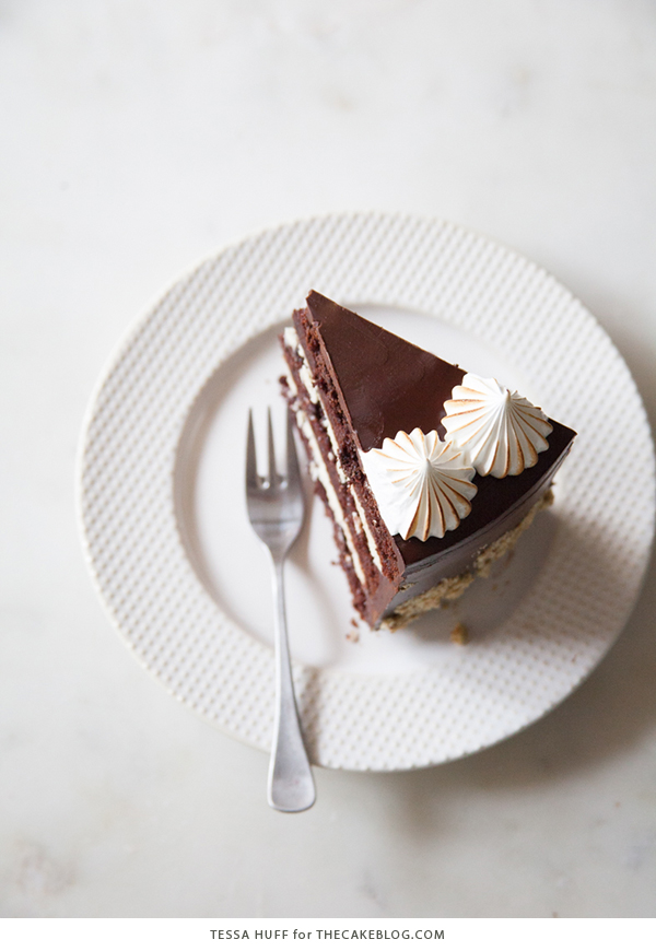 S'mores Cake - s'more inspired layer cake recipe with chocolate cake, graham cracker buttercream, chocolate ganache and toasted marshmallow meringue | by Tessa Huff for TheCakeBlog.com