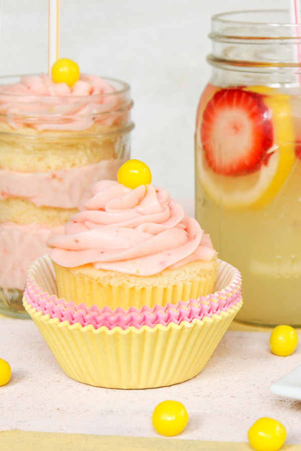 Strawberry Lemonade Cupcakes - moist lemon cupcakes paired with fresh strawberry buttercream for the perfect combination of sour and sweet | by Lauren Kapeluck for TheCakeBlog.com