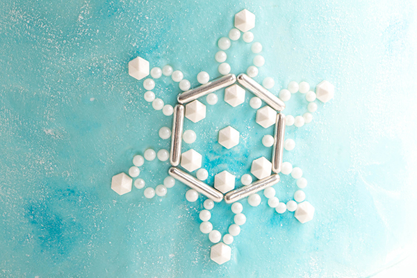 Sueded Buttercream Cake with Sprinkle Snowflakes | by Erin Gardner for TheCakeBlog.com #cake #winter #christmas #christmasdessert