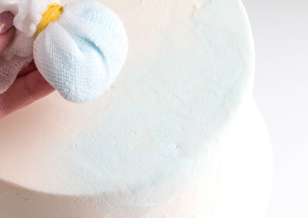 Sueded Buttercream Cake with Sprinkle Snowflakes | by Erin Gardner for TheCakeBlog.com #cake #winter #christmas #christmasdessert