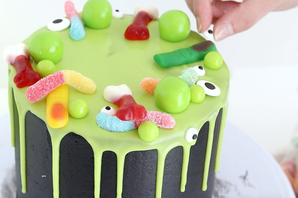 Witch Cauldron Cake - how to make an amazing Halloween cauldron cake that looks like bubbling witches' brew | by Whitney DePaoli for TheCakeBlog.com