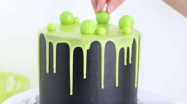 Witch Cauldron Cake - how to make an amazing Halloween cauldron cake that looks like bubbling witches' brew | by Whitney DePaoli for TheCakeBlog.com
